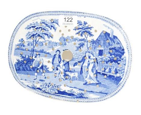 A Staffordshire Pearlware Drainer, circa 1825, printed in underglaze blue with the Bee Master pattern, 25.5cm wide.  No damag