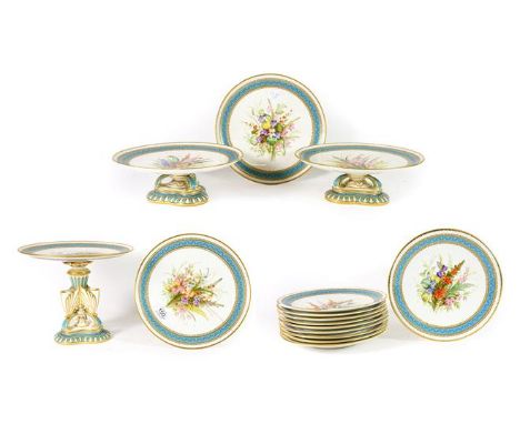 A Royal Worcester Porcelain Dessert Service, 1876, painted with sprays of flowers within a light blue and gilt border with wh