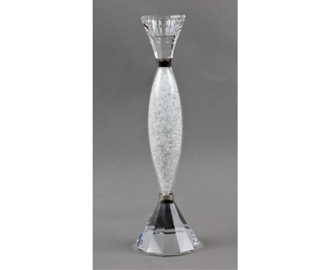 A Swarovski Crystal candlestick holder, in box, approx 26cm x 7cm. IMPORTANT: Online viewing and bidding only. Collection by 