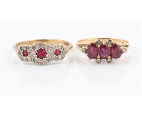 A hallmarked 9ct yellow gold ruby and diamond ring, set with three oval cut rubies and diamond accents to edges, ring size L,