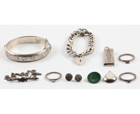 A collection of various jewellery, to include a hallmarked silver bangle, a hallmarked silver ingot, a curb link bracelet wit