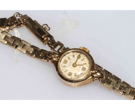 9 carat gold Rotary Maximus bracelet watch.