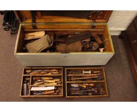 Carpenters tool trunk and carpentry tools.