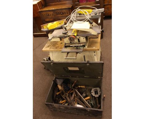 Multi-tool saw bench, trunk of tools and two bench vices.