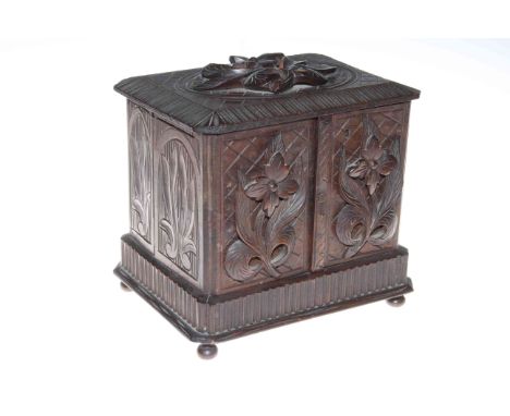 Carved Black Forest pipe cabinet, 21cm by 22cm.