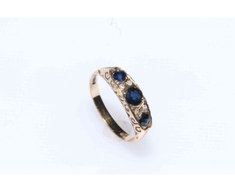 Sapphire and diamond ring set in 9 carat gold.