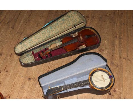 Banjo in case and a violin with bow in case.