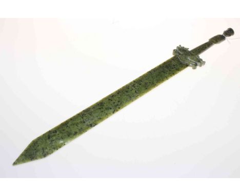 Chinese green jade sword, carved with beast hilt and elder finial.