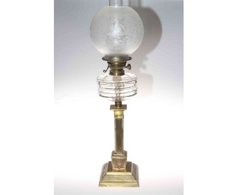 Victorian brass square reeded column oil lamp with a clear glass reservoir and etched shade, 75cm.