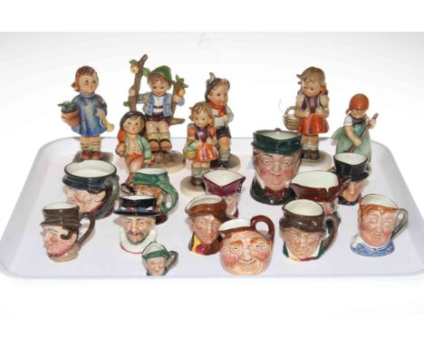 Seven Hummel figures and collection of Royal Doulton character jugs.