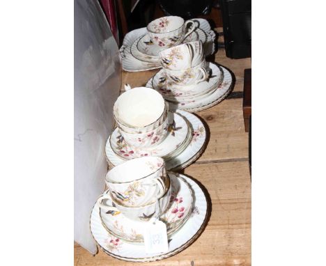 Twenty four piece Victorian part tea service with bird, berry and butterfly decoration.