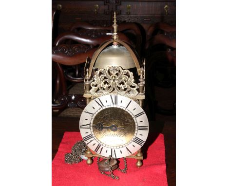 Brass lantern clock by Thomas Moore of Ipswich with 17cm diameter dial.