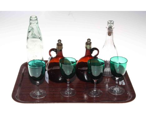 Small 19th Century decanter, two brown glass bottles, four green wine glasses and vintage bottle.