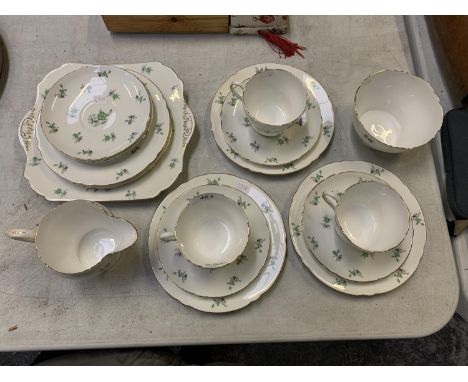 A 'SHELLEY' CERAMIC PART TEA SET TO INCLUDE CUPS, SAUCERS, SUGAR BOWLS ETC 