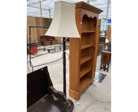 A MAHOGANY STANDARD LAMP 