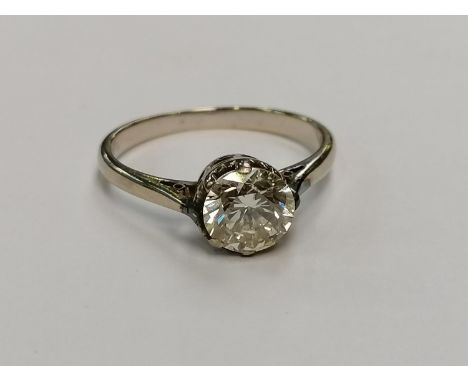 A LADIES SINGLE STONE 1.33CT ROUND BRILLIANT DIAMOND RING, COLOUR M/N, CLARITY VS1/VS2, TESTS TO 18CT WHITE GOLD, STAMPED 91,