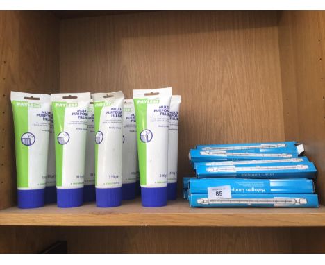 TWELVE TUBES OF MULTI PURPOSE FILLER AND A LARGE QUANTITY OF HALOGEN LAMP BULBS 