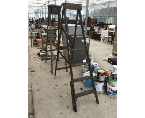 A SET OF VINTAGE SIX STEP WOODEN FOLDING LADDERS 