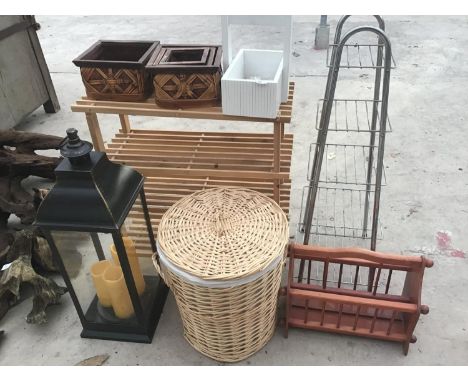 THREE RACKS, A LARGE LANTERN WITH CANDLES, WICKER BASKETS AND PLANTERS ETC 