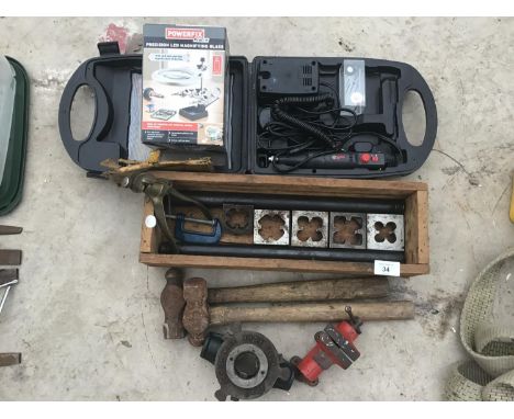A CASED MULTI TOOL WITH ATTACHEMENTS, A PRECISION LED MAGNIFYING GLASS, TAP AND DIES HAMMERS ETC 