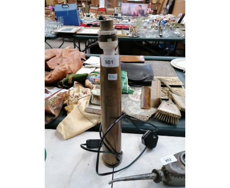 A 1942 DATED SHELL CASE CONVERTED LAMP 