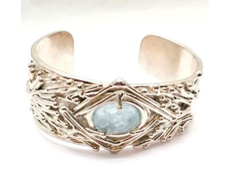 Alain Fleche designer made unmarked white metal cuff bangle set with blue cabochon stone - 66g ~ slight dent to back otherwis