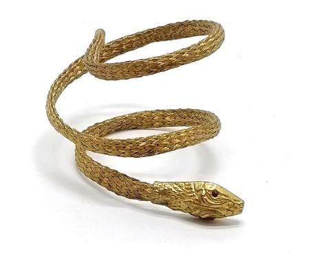 Antique gilt metal snake bangle with red stone eyes 