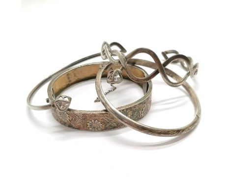 3 x silver bangles inc antique decorated with flowers (slight a/f) - total weight 34g t/w unmarked sprung bangle with heart s