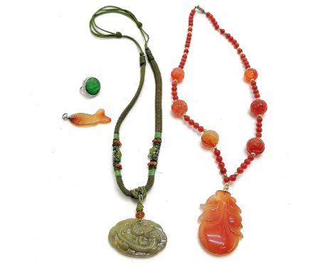 Hand carved oriental jade panel set ring (size H), cornelain carved fish pendant, silver mounted hardstone necklace (50cm) &a