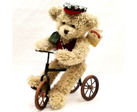 Biking teddy on a tricycle - 42cm tall 