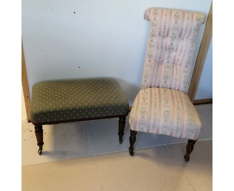 An Antique button back nursing chair on turned legs ending in castors, 100 cm in height, 49 cm in width,  60 cm in depth, t/w