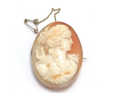 Antique 9ct marked brooch hand carved cameo portrait in a classical style. 4.5cm drop. 12.8 g total weight. 