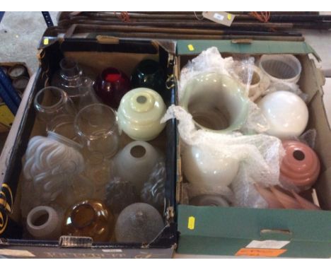 A large collection of various oil lamp and light shades to include flambe examples