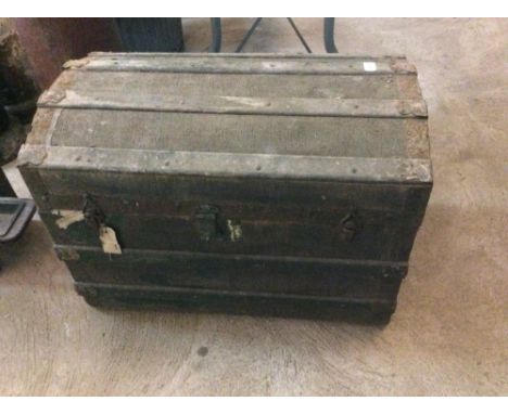 A canvas and battened domed trunk
