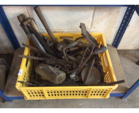 A crate of various old tools