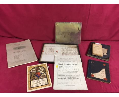 A framed indenture; photographic print on glass; a ledger; various ephemera; Coronation programme; Ipswich ordnance survey ma