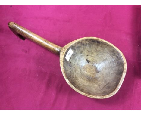 An early wooden ladle