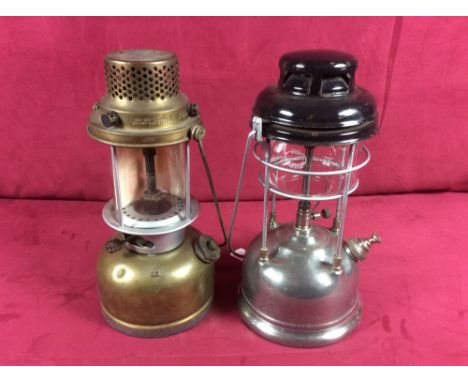 A tilley lamp and a Bialadin lamp