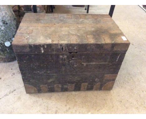 An old wooden and metal bound trunk