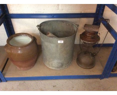 A galvanised pail; an earthenware crock; and a tilley lamp etc.