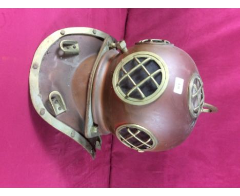 A copper and brass diver's helmet