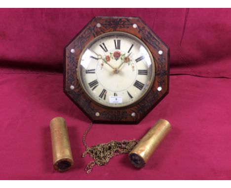 A Victorian octagonal cased mother of pearl inlaid wall clock; and two weights