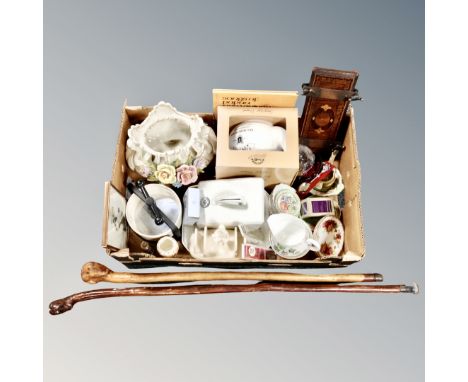 A box of two walking sticks, continental ceramic table centre piece, inlaid tie press, tea china, Maling ware, Minton etc 