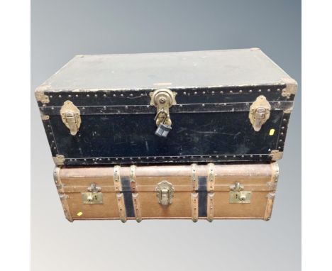 A vintage metal bound shipping trunk and a wooden bound trunk 