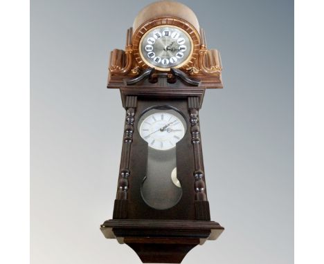 A Decoz Quartz decorative mantel clock and a wall clock 