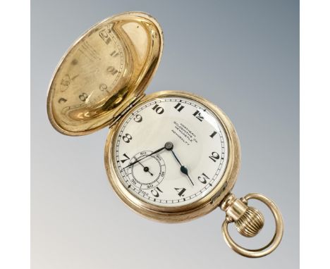 A gold plated full hunter pocket watch, signed Northern Goldsmiths Co. Newcastle, Admiralty, fifteen jewel lever movement tim