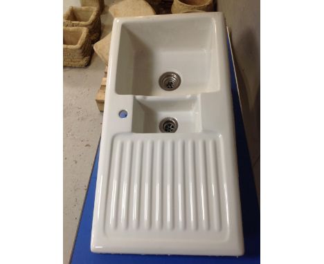 A ceramic sink with drainer 