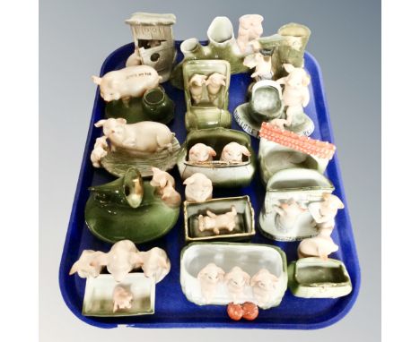 A tray of a collection ceramic pig dishes and vases 