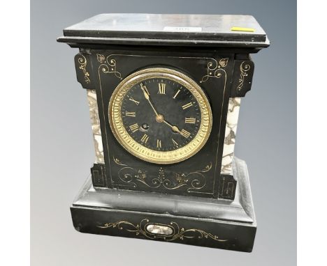 A Victorian black slate and marble mantel clock 