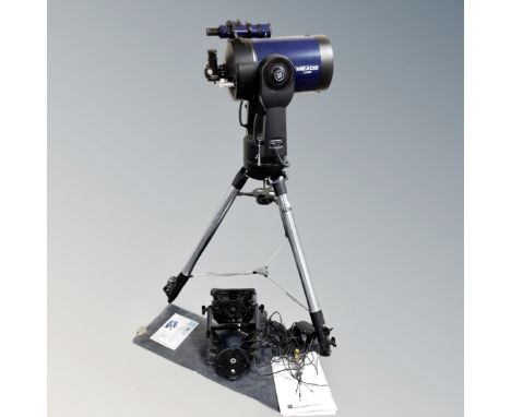 A Meade LX90 Schmidt-Cassegrain computerised high resolution telescope on field tripod with Condor AC power adaptor and remot